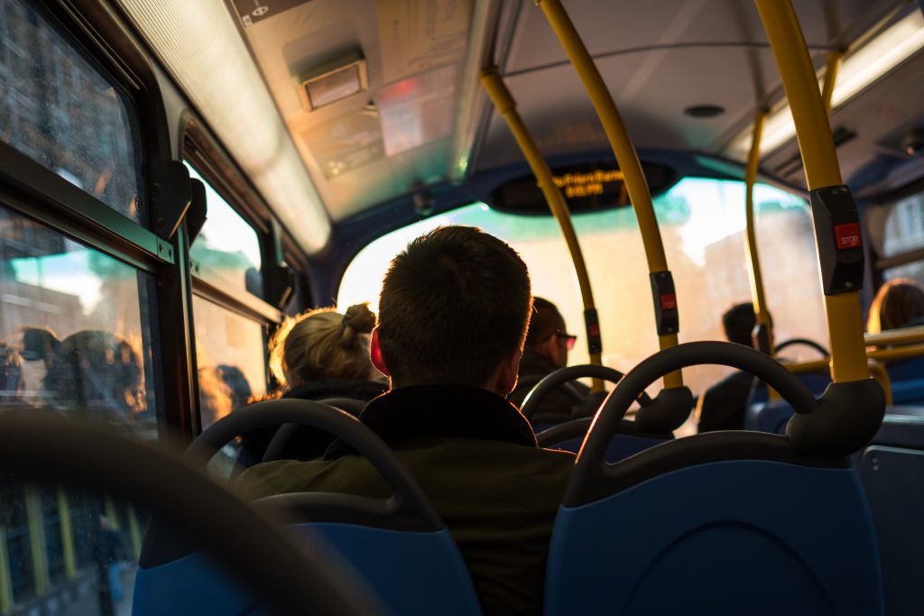 Man sitting on a bus